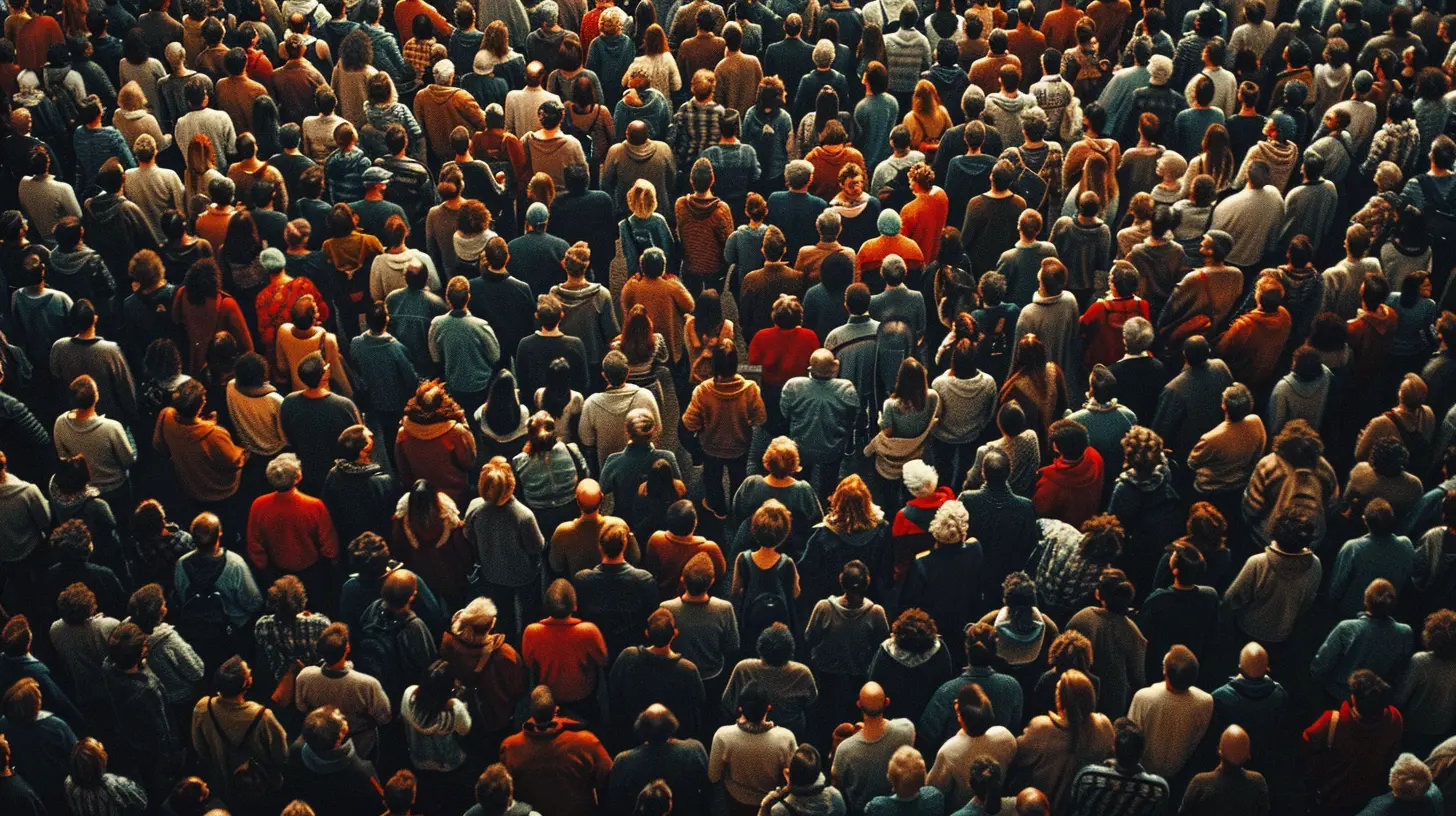 The Social Psychology of Crowds: Why We Act Differently in Large Groups